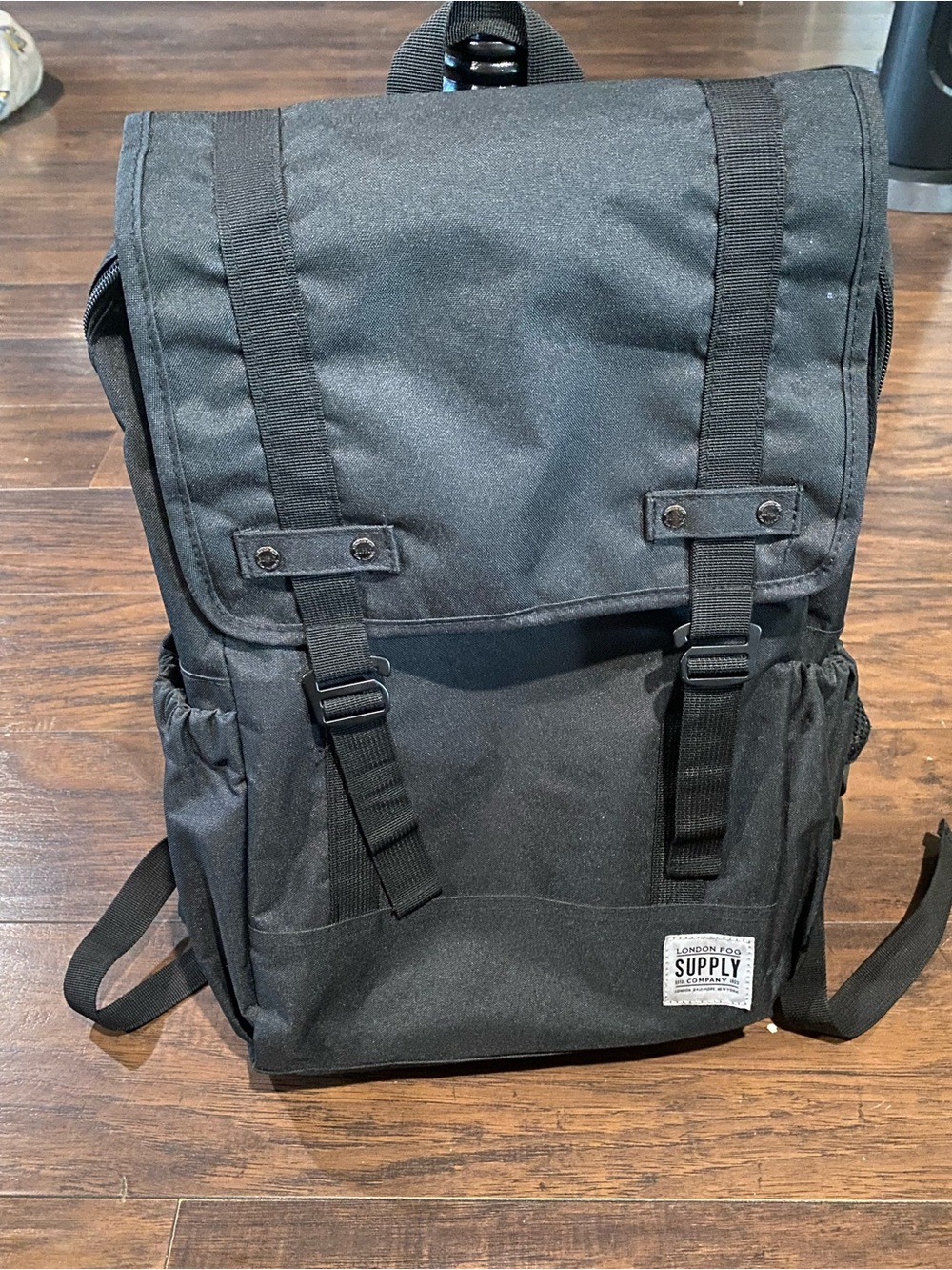 London Fog Black Canvas Flap Backpack with Buckle Straps